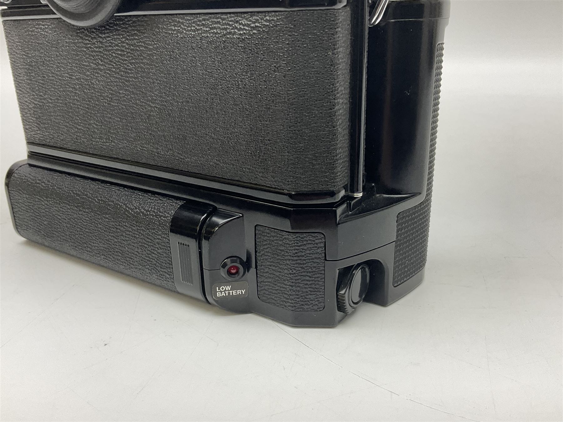 Canon F1 camera body, serial no. 136281, with 'Canon FD 50mm 1:1.8 S.C' lens, serial no.1702944 and Canon F Power winder, serial no.120072