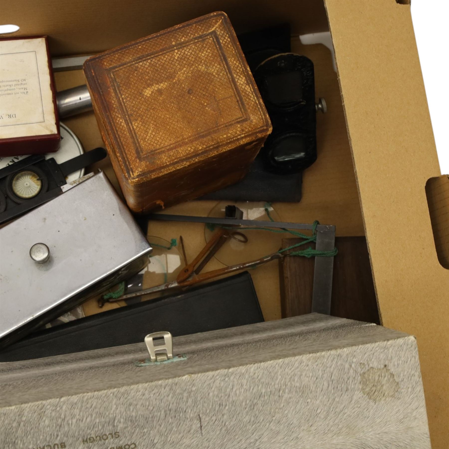 Carriage clock in brass and bevelled glass case and outer leather travelling case, stereo viewer, box of Dr Wells Stereoscopic Charts, large Monarch magnifying glass and other optical items
