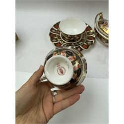 Royal Crown Derby 1128 Old Imari pattern, teacup and saucer, plate with fluted edge and open sucrier, together with spode twin handled sucrier
