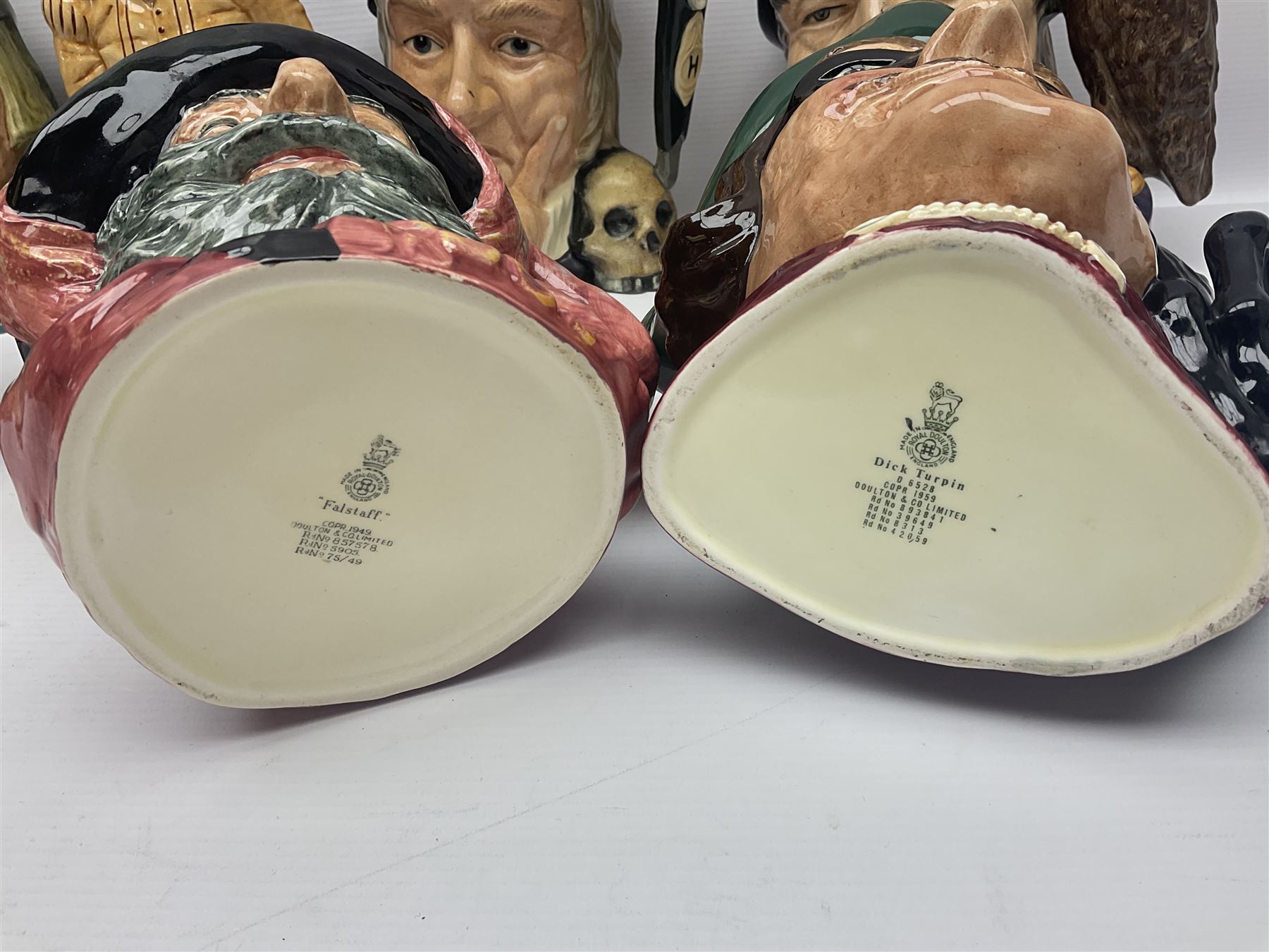 Eight Royal Doulton character jugs, including St George D6618, Guardsman D6568, The Juggler D6835 etc, together with Royal Doulton toby jug Sir Francis Drake D6660