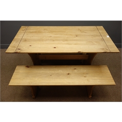  Pine table, solid end supports joined by single stretcher, (W61cm, H76cm, L121cm), with two matching benches.  