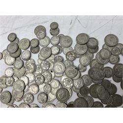 Approximately 1460 grams of pre 1947 Great British silver coins, including sixpences, shillings and two shillings 