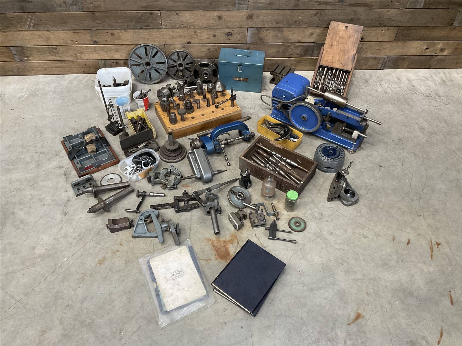 Myford Super 7 metal turning lathe with extensive collection of attachments, chucks, collets, bits; and precision metal saw