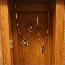 Mouseman - mid-20th century oak longcase clock, with a high quality weight driven movement and dial by Sinclair and Harding & Co of Cheltenham, the rectangular hood carved with foliate ornament, over a glazed and oak trunk on stepped base, with carved mouse signature, by the workshop of Robert Thompson of Kilburn Provenance: purchased directly from the Kilburn workshop in the 1940s/1950s