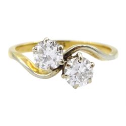 18ct gold two stone round brilliant cut diamond crossover ring, stamped, total diamond weight approx 0.75 carat