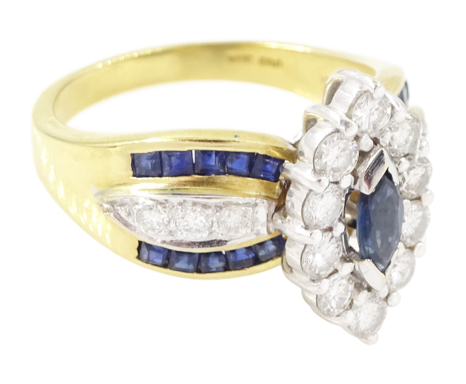 18ct gold sapphire and diamond cluster marquise shaped ring, single marquise cut sapphire, surrounded by ten round brilliant cut diamonds, each shoulder set with three round brilliant cut diamonds and ten calibre cut sapphires, hallmarked, total diamond weight approx 0.90 carat