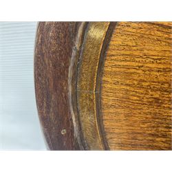 Late 19th/early 20th century mahogany and marquetry inlaid tray, of oval form with twin scrolled handles and moulded border, the central panel inlaid with figures seated at a table drinking tea, L99cm