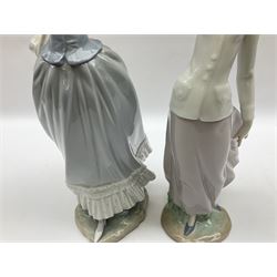 Three Lladro figures, comprising, Dreams of Summer Past no 6401, Spring Breeze no 4936 and Breezy Afternoon 5682 together with Lladro plaque Art Brings us Together no 7677, all in original boxes, largest example H35cm