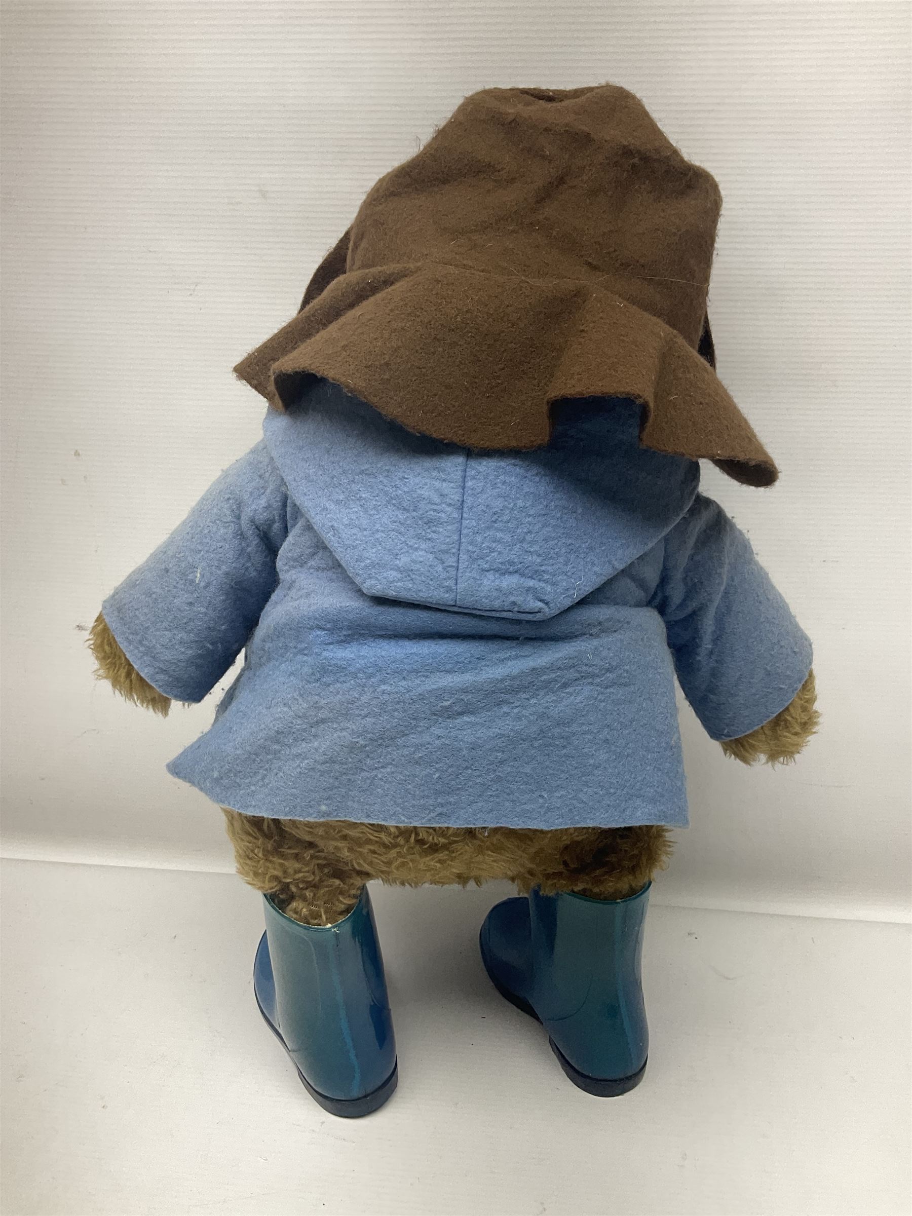 Paddington Bear with plush covered body, brown felt hat, pale blue duffle coat and blue wellingtons H54cm
