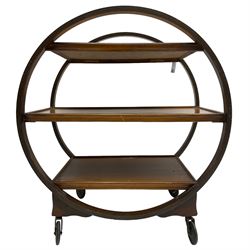 1930s Art Deco period walnut Moon drinks trolley, three tiers encased by two circular supports, raised on castors