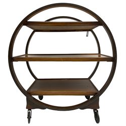 1930s Art Deco period walnut Moon drinks trolley, three tiers encased by two circular supports, raised on castors