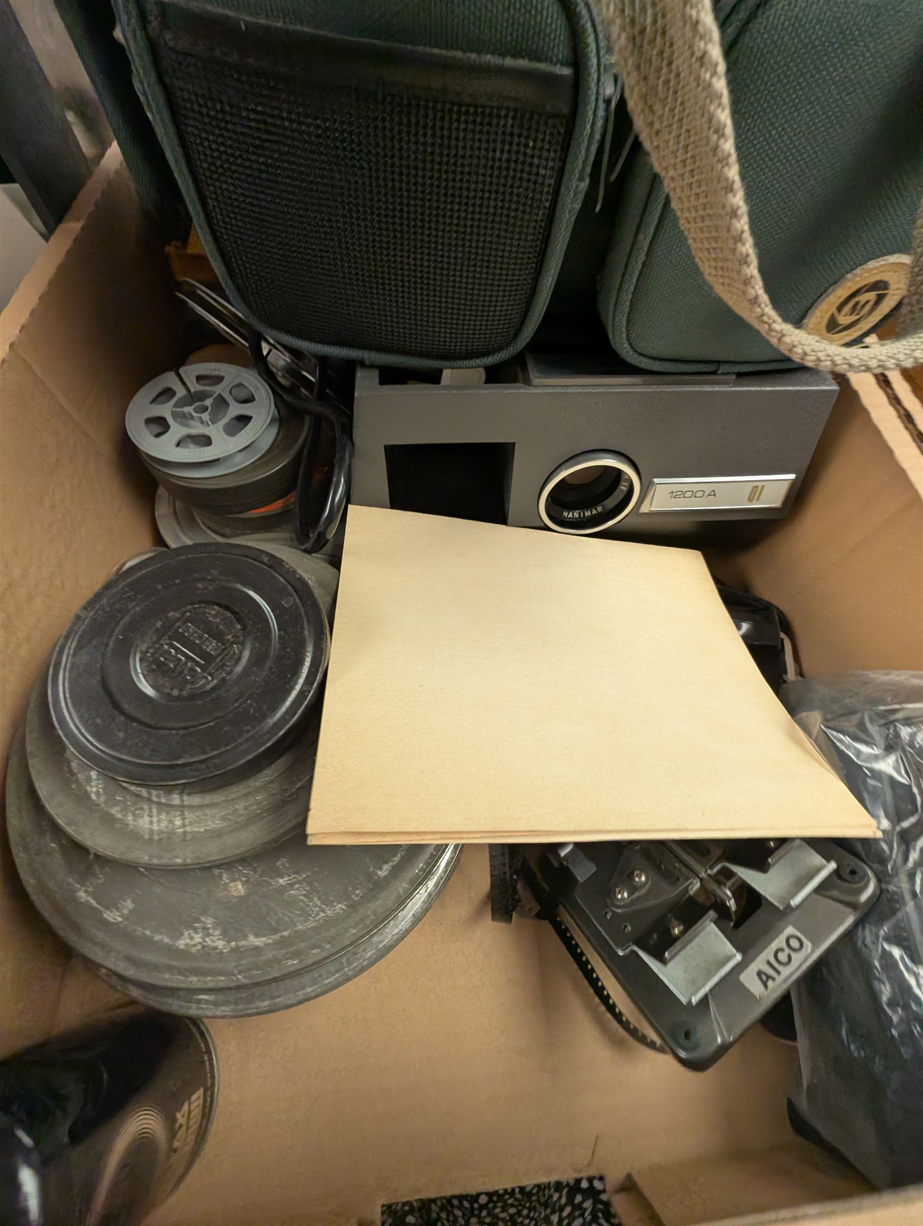 Voigtlander Vito BL camera, boxed, Pentax PC-5000, Canon SSure Shot Af7, Hanimex Rondette 1200A projector, Jedson trumpet, JVC Compact VHS camera, McClure projector, two briefcases and camera accessories