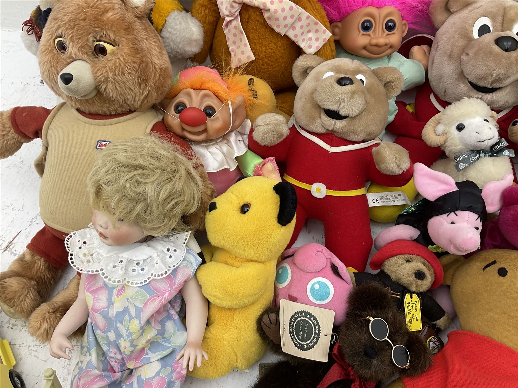 Quantity of stuffed toys and dolls to include Teddy Ruxpin, Cabbage Patch, Troll doll, and a quantity of plastic toys including Sylvanian Families Country School etc, in two boxes