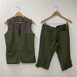 Ladies Musto 'Sporting Ladies' tweed waistcoat and breeks, size 10, together with a ladies Barbour 'Sporting' tweed waistcoat, and a Driza-Bone full length riding coat, size M. (4). 
