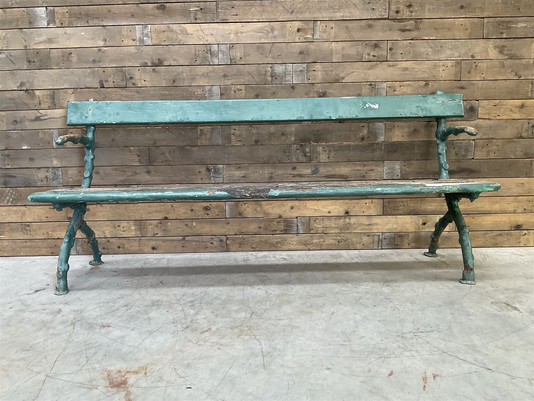 Early 20th century cast iron framed faux bois garden bench, timber seat and back rest