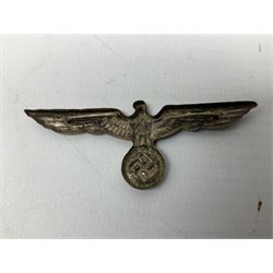 Five WW2 German peaked cap badges, four with double-pinned backs