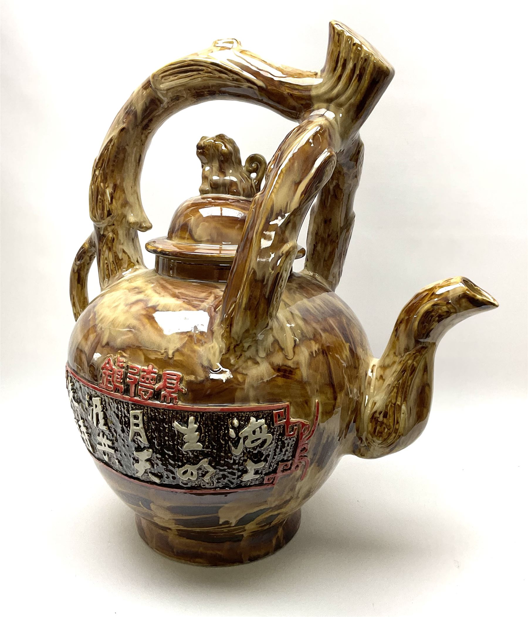 A large novelty Chinese ceramic teapot, the body decorated with