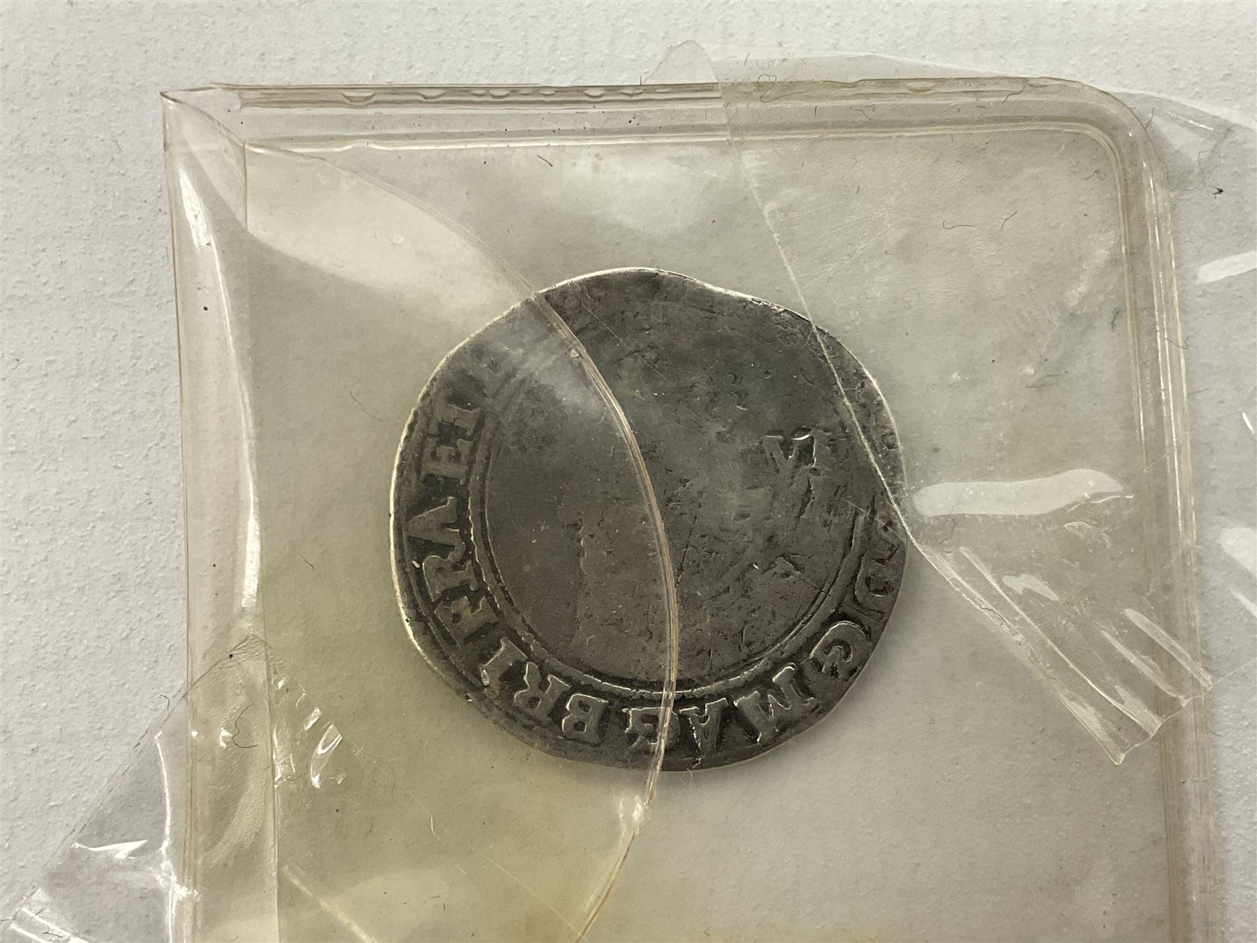 Charles I 1625 hammered silver sixpence, Queen Victoria 1894 crown coin and a cased hallmarked silver medal for the Hull photographic society, engraved '1940' 'Leonard Vokes', all housed in a red Pobjoy Mint coin box