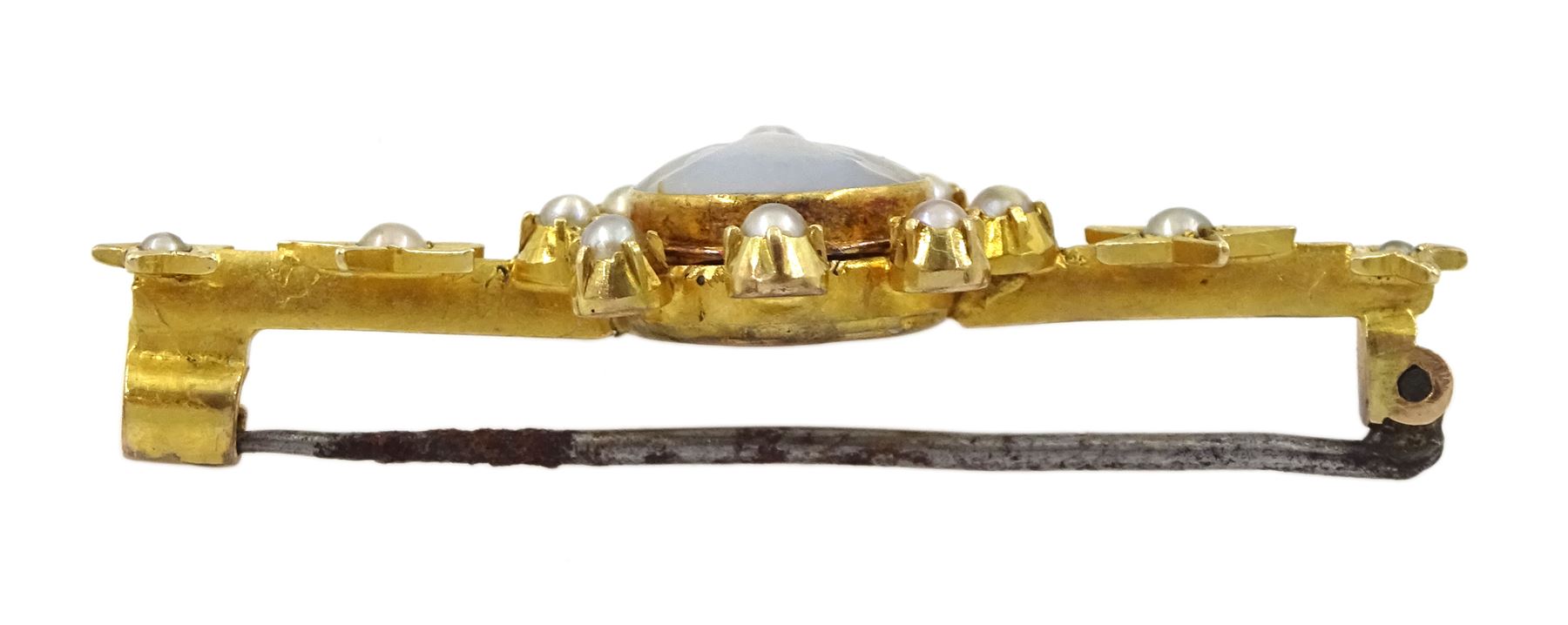 Victorian 15ct gold moonstone and seed pearl brooch, the carved 'Man in the Moon' moonstone with pearl surround and two pearl set stars set either side