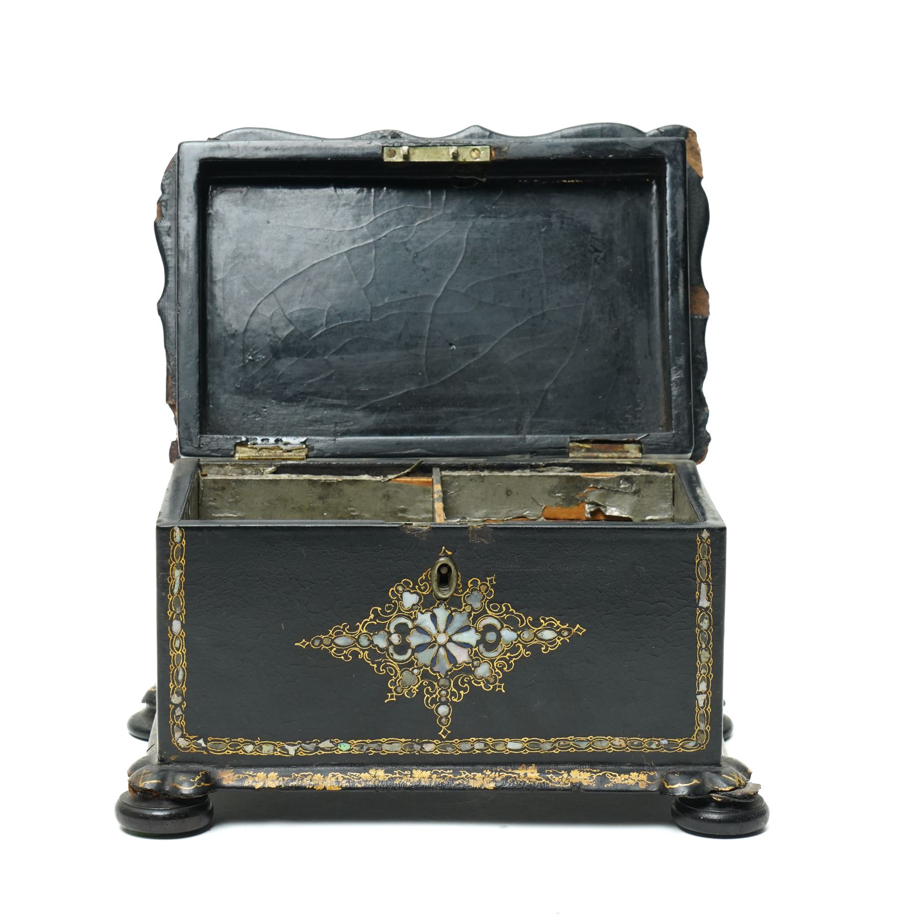 Victorian papier mache tea caddy inlaid with mother of pearl and gilt on compressed bun feet W20cm