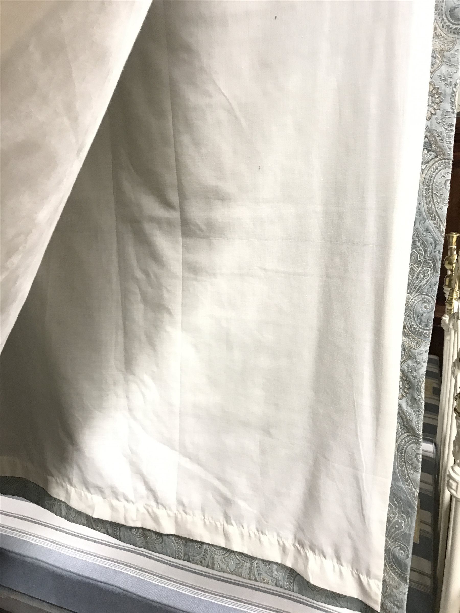 Pair lined curtains in light blue paisley patterned fabric, W220cm