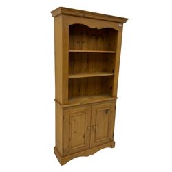 Solid pine open bookcase with two cupboards