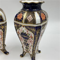 Pair of early 20th century Royal Crown Derby Imari 1128 pattern vases, of tapering straight sided form with waisted neck and frilled rim, upon four splayed feet, with printed and painted marks beneath including illustration date codes for 1911 and 1920, H17cm
