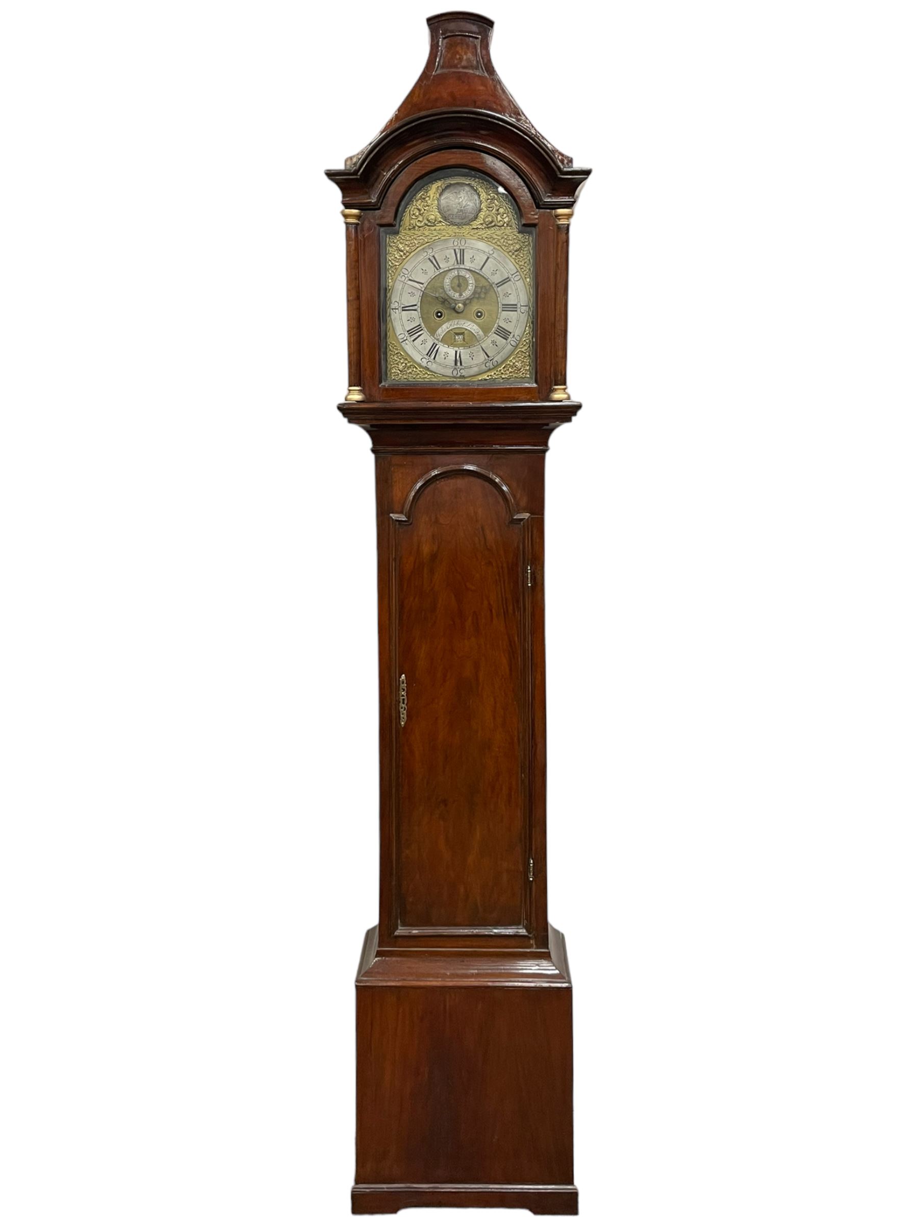 John Abbot of London – early 18th century walnut 8-day longcase clock c1740, hood with glazed side panels and tall swept pagoda pediment above a break arch hood door with attached pillars and gesso wooden capitals, long trunk door with a conforming break arch top on a rectangular plinth with applied shaped skirting, brass dial with a matted center and continuous herringbone engraving to the surround, cast spandrels, silvered chapter with Roman numerals, five minute Arabic’s, minute track and inner quarter hour track, subsidiary seconds dial and square date aperture, silvered tempus fugit boss to the break arch, dial pinned directly to a rack striking movement, striking the hours on a bell. With weights and pendulum.