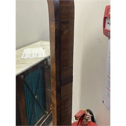 Early 19th century mahogany cheval dressing mirror, plain mirror plate within chamfered frame with arched top, on rolled horns and out-splayed rolled feet, united by turned stretcher 