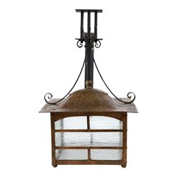 20th century, Arts and Crafts style copper porch lantern, of rectangular form, with cast i...