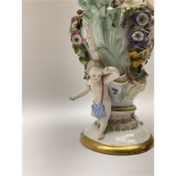 Meissen potpourri vase and cover, for restoration, of baluster form decorated with hand painted panel of a courting couple, and panel of a floral spray, further detailed with hand painted sprigs and encrusted flowers, flanked by two putti, with blue crossed swords mark beneath, H25cm, together with a Dresden teacup and saucer, decorated with alternating panels of courting figures, and floral sprays against a yellow ground, with mark beneath, teacup H6.5cm