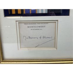 Montgomery (Bernard Law, 1887-1976). British Field Marshal of WW2 and Viscount of Alamein - signed titled signature card 'Montgomery of Alamein', professionally mounted and framed with representative rows of his ribbon bars and photographic print of him seated on a field stool; 29 x 38.5cm; gilt frame