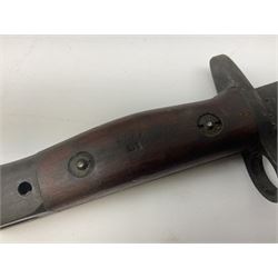 Australian Owen sub-machine gun bayonet, the 25.5cm fullered steel blade marked '53'; in metal bound wooden scabbard marled MA53 L41cm overall
