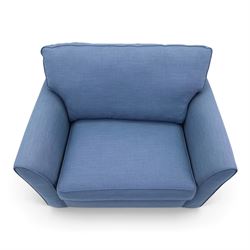 Contemporary blue small sofa bed, shaped arms with loose seat cushions, stowed bed beneath, raised on light wood feet