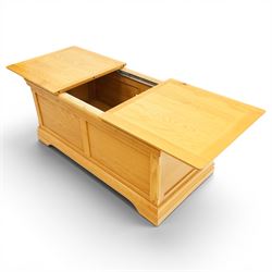 Contemporary solid oak blanket chest, rectangular sliding two-part top on metal runners enclosing storage compartment, panelled front and sides