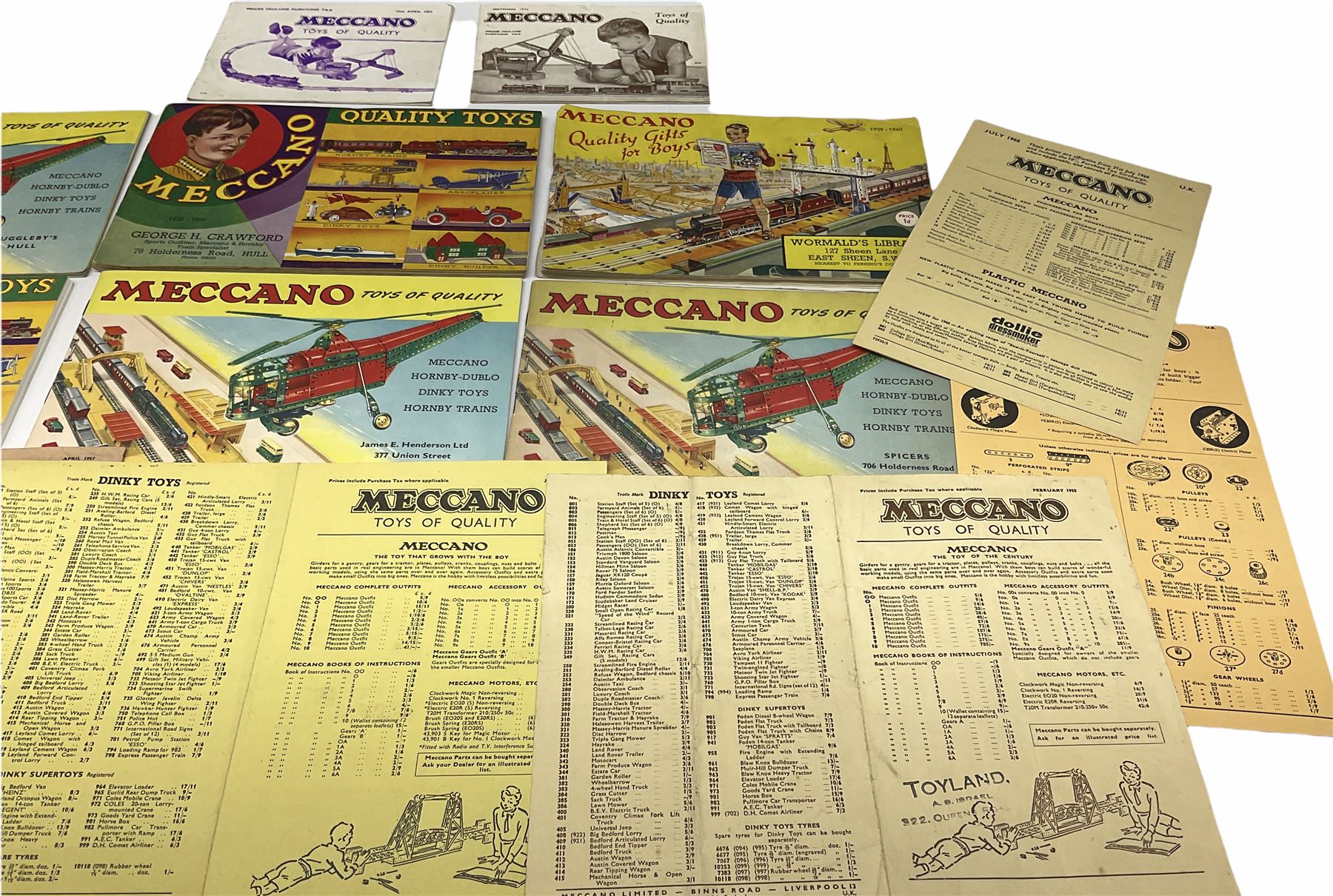 Meccano - toy shop point-of-sale cardboard advertising sign with easel back, depicting a boy finishing a large Eiffel Tower H37cm; nine catalogues 1938/9, 1939/40, 1952, 1953, three x 1956, 1958 and HRCA 1994 copy of 1939/40, bearing various toy shop addresses to front covers, some with price lists; and seven price lists 1949 - 1966.