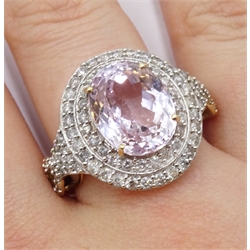  18ct gold oval kunzite and two row diamond cluster ring, with diamond set shoulders by  Lorique, hallmarked  
[image code: 4mc]