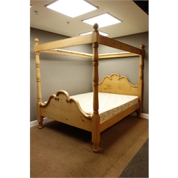  Waxed pine 5' Kingsize four poster bed with shaped head and footboard turned supports, with mattress   