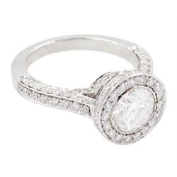 18ct white gold single stone round brilliant cut diamond ring, with pave set diamond surround, gallery and shoulders, principle diamond approx 1.20 carat
