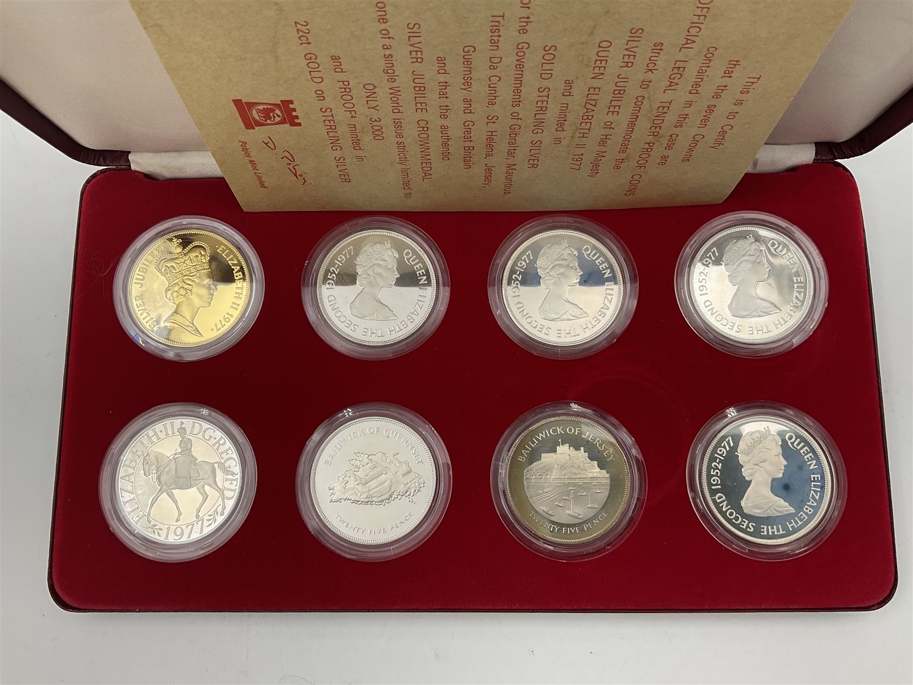 Pobjoy Mint sterling silver proof seven crown coin and gold plated sterling silver proof 'Silver Jubilee Crownmedal' set, commemorating the 'Silver Jubilee of Her Majesty Queen Elizabeth II 1977', cased with certificate