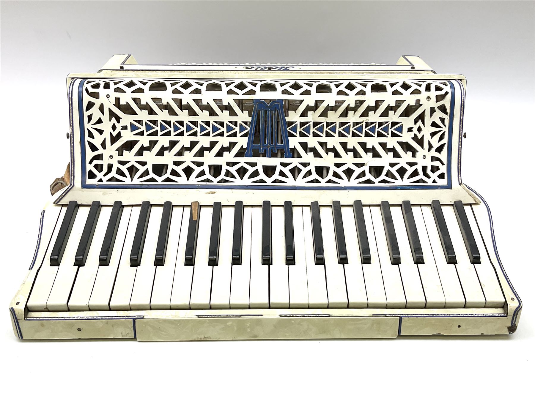 Italian Lambardi piano accordion in ivory coloured pearline case with jewelled decoration, twenty keys and one-hundred and twenty buttons L 37cm