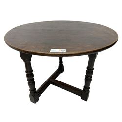 Late 18th century mahogany and oak three-legged cricket table, circular mahogany top on oak base, turned supports united by moulded stretchers