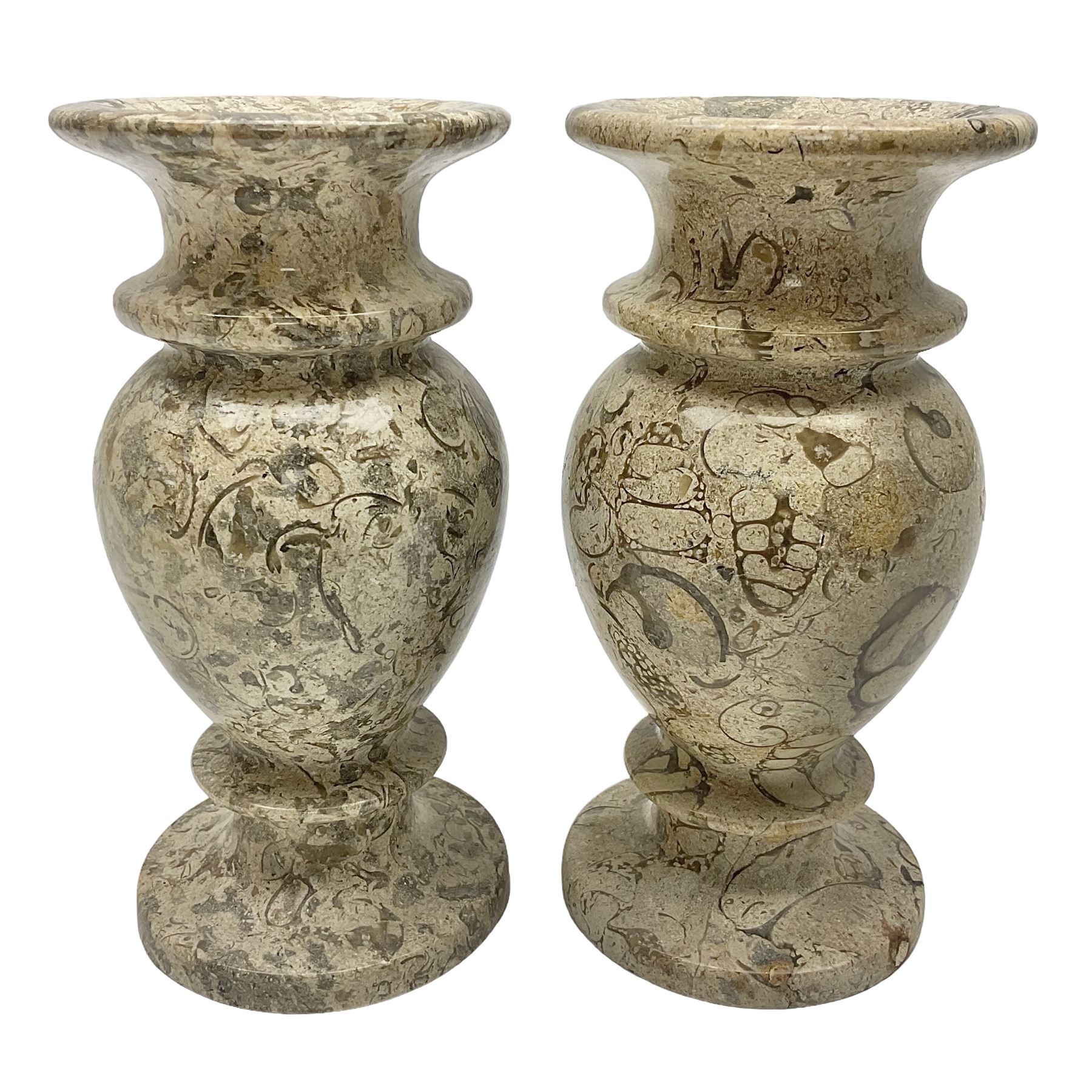 Pair of vases, of baluster form upon a stepped foot, with shell inclusions within the limestone, H15cm  