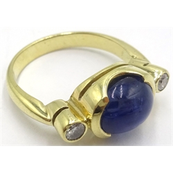  Gold ring set with cabochon sapphire and two diamonds, gold tested 14ct  
