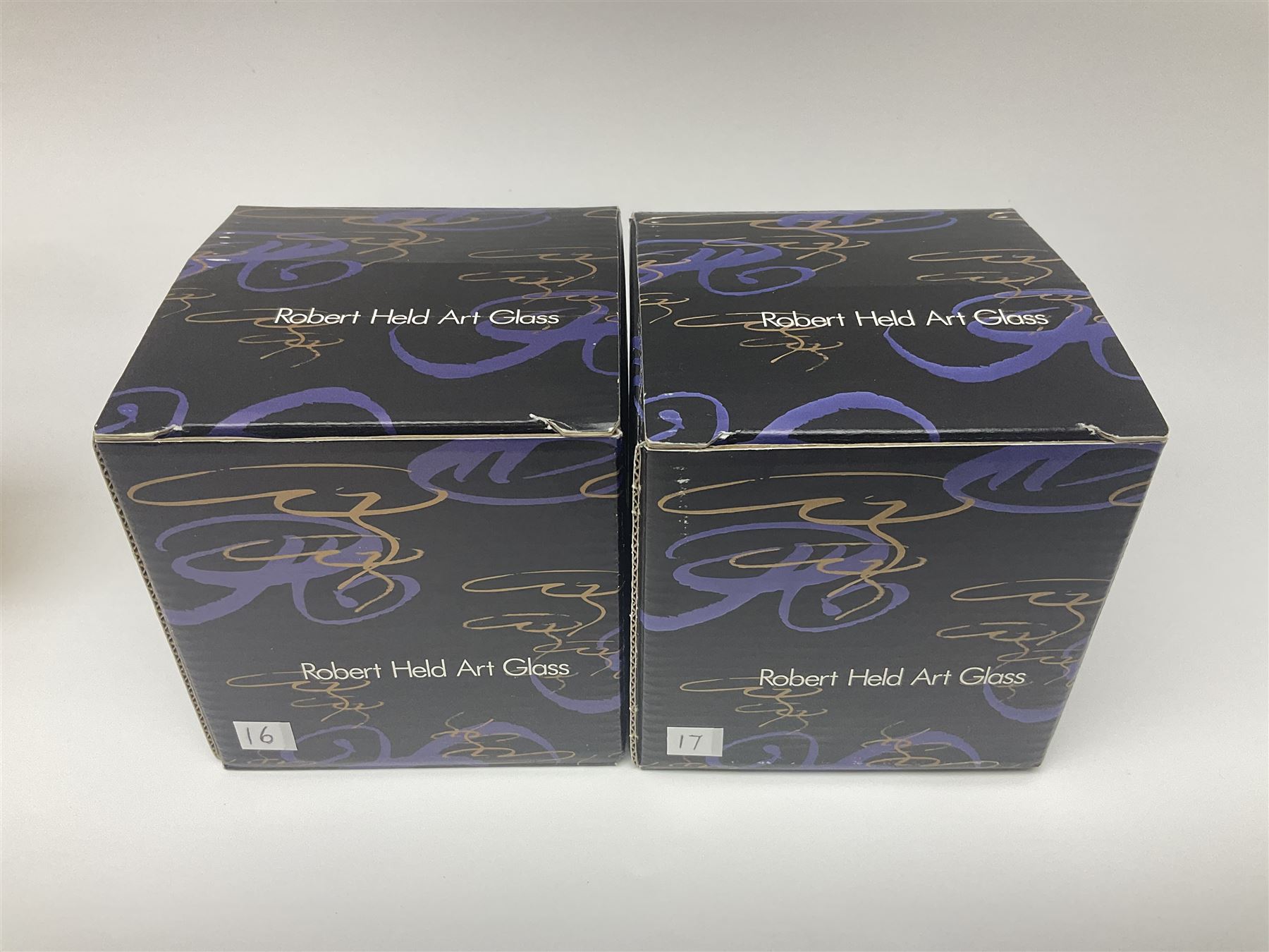 Two Robert Held glass vases, together with Adrian Sankey apple paperweight, vases H10cm 