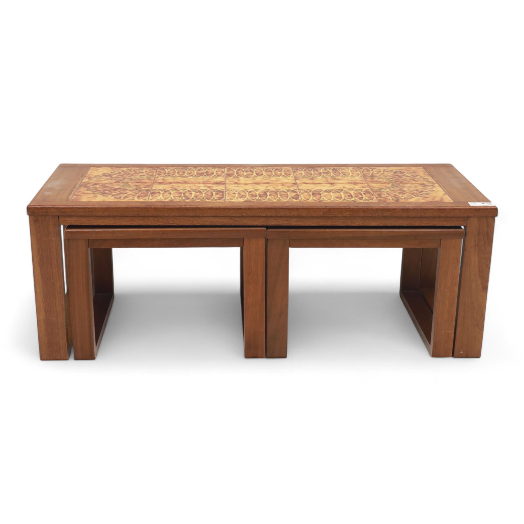 Mid-20th century ‘Long John’ teak nest of coffee tables, rectangular form with ceramic tile inset top, enclosing two smaller square tables with matching tile decoration