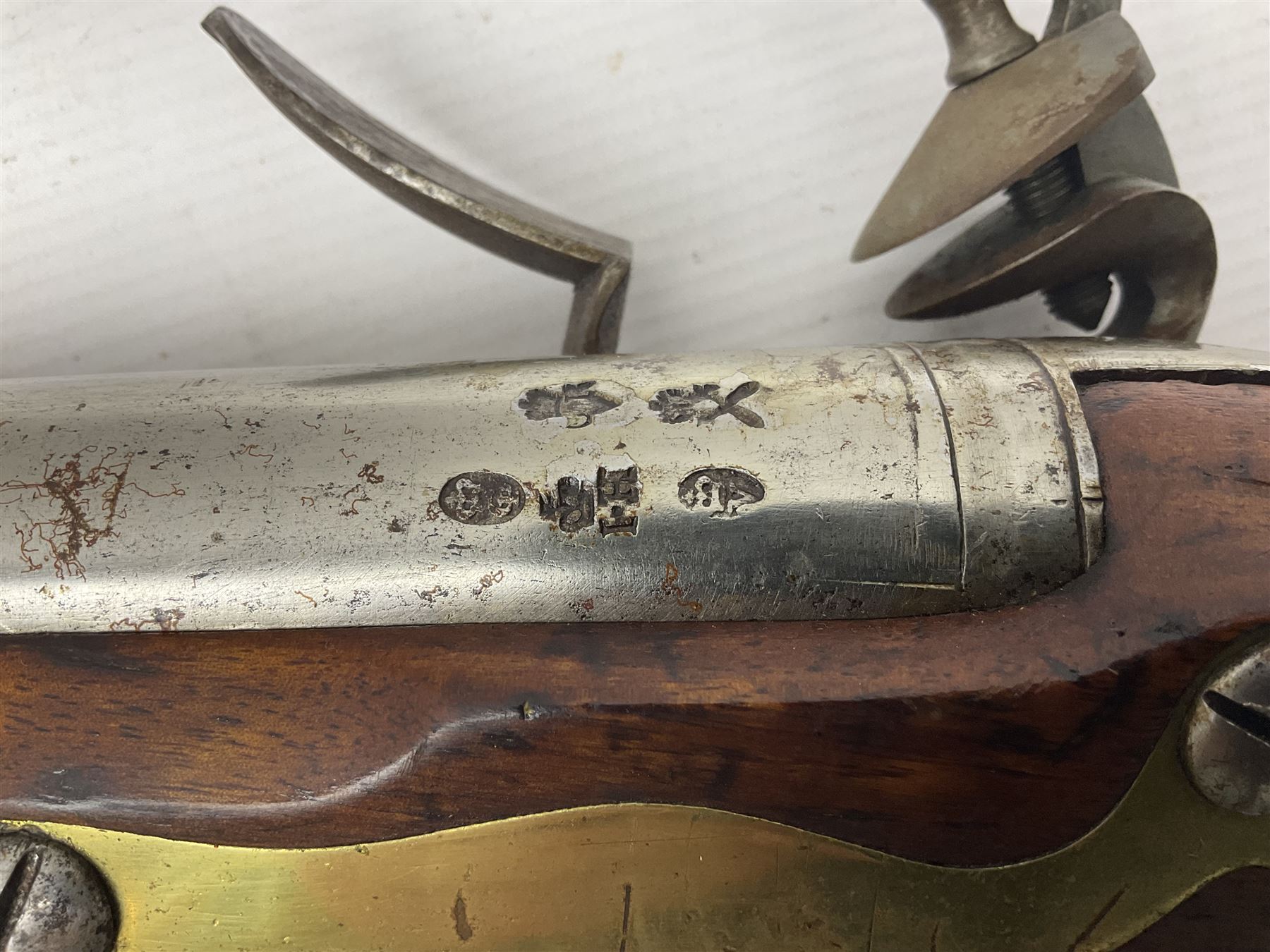 Brown Bess style 10-bore flintlock musket, the action marked with Crowned GR, 'Jordan' and dated 1758, the 104cm(41