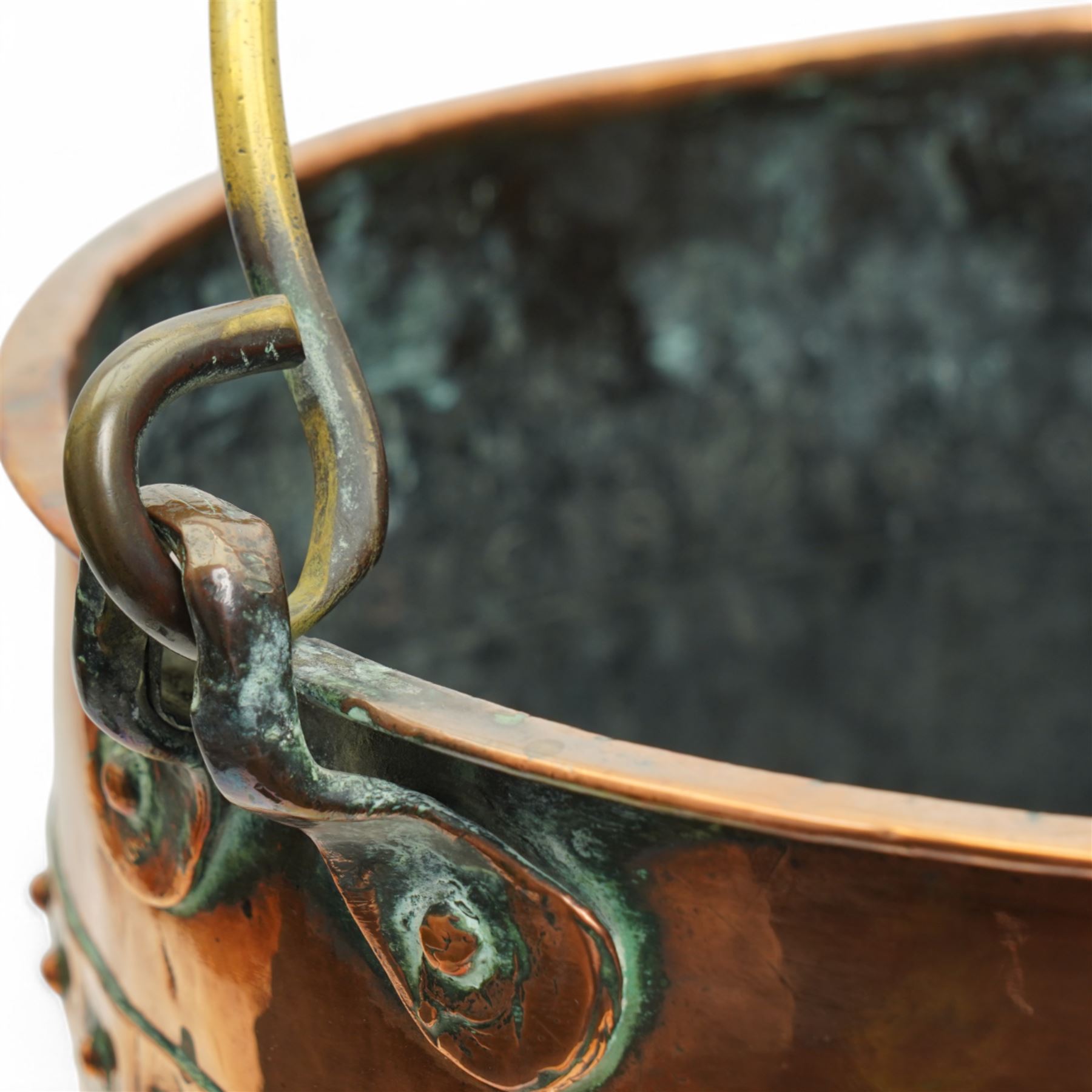 Early 20th century copper bucket, with cylindrical riveted body and brass loop handle, H31cm D34cm  