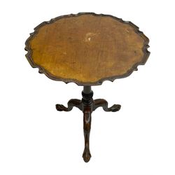 George III mahogany tripod table, pie-crust tilt-top on birdcage action with turned columns, turned column with twist baluster, on out-splayed ball and claw carved feet with foliate and shell cartouche carved knees 