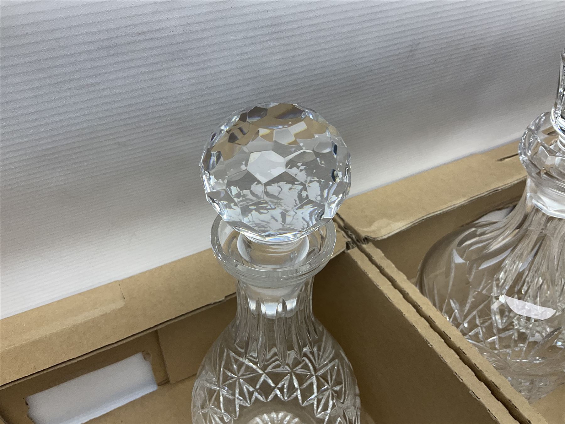 Collection of Waterford and Tyrone crystal, including wine glasses, clock, bowl, etc, together with a collection of other cut glass and crystal